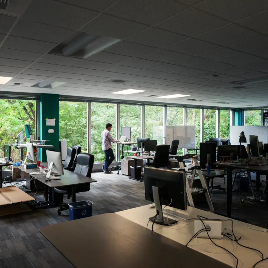 African American businessman working in empty office