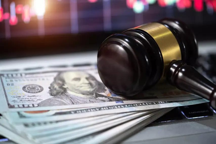 Gavel and hundred dollar bills