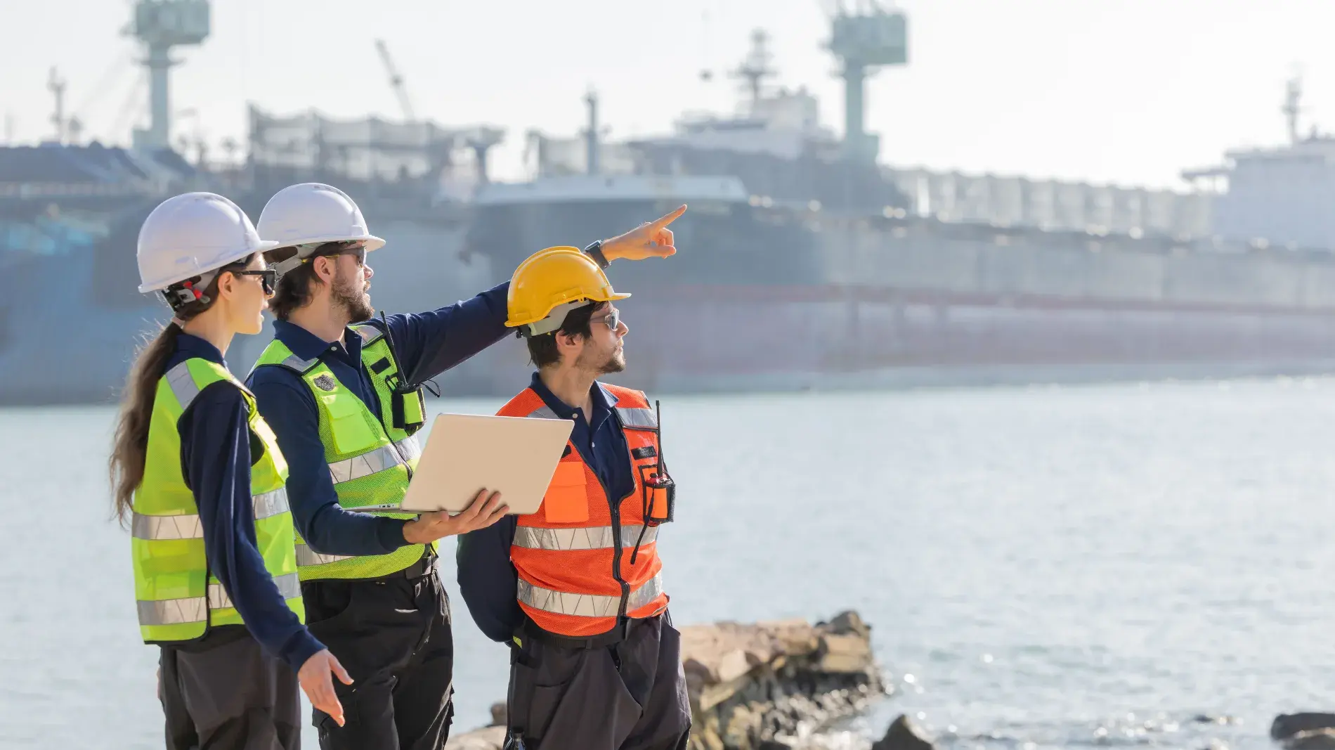 construction-workers-overseeing-cargo