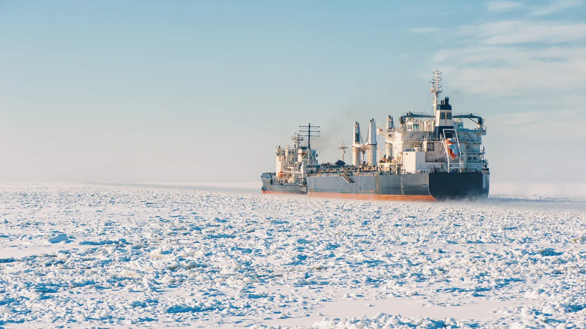 cargo-ship-ice-ocean-frozen