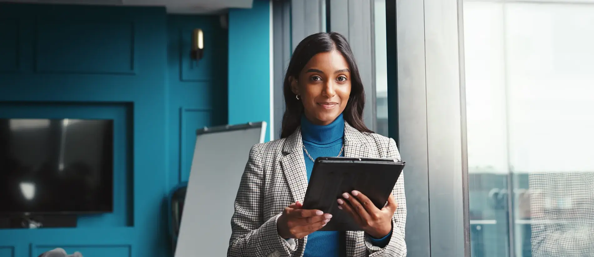 Portrait, confident and woman with tablet, window and online for financial report in office and smile. Corporate, accountant and person with tech for tax filing, app and info for profit of business