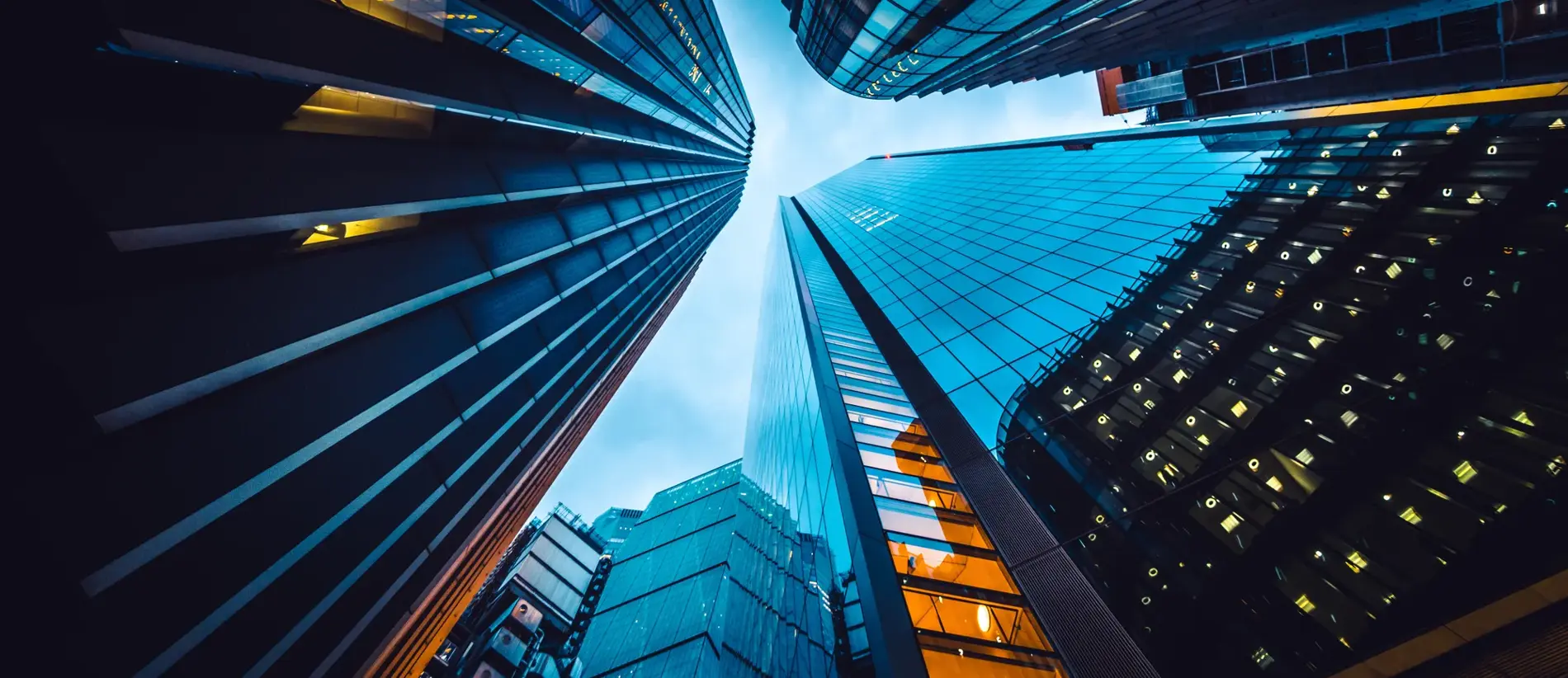 Looking directly up at the skyline of the financial district in central London