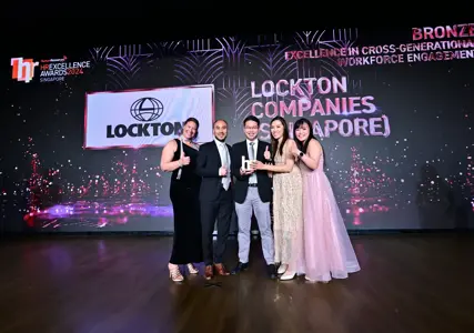 Lockton Singapore extends heartfelt congratulations to our HR team for their recent achievement!
At the 2024 HR Excellence Awards hosted by Human Resources Online, Deven Lim, CEO of Lockton Singapore, attended the event alongside our HR team members: Natalie Salord, Regional HR Operations Lead – Asia, XinNi Lim, Head of HR, Dior Goh, and Christopher Ng. Together, they embraced the event's theme of ‘Metallic Magic’ and proudly received the Bronze Award in Cross-Generational Workforce Engagement.
At Lockton, we value the unique strengths and insights that each generation brings to the workplace. This recognition is especially significant as we navigate Singapore's current demographic challenges. By celebrating our diverse talents, we continue to foster innovation and success.
Congratulations once again to our exceptional HR team! A special thank you to Deven Lim, Victoria Edwards, Natalie Salord, XinNi Lim, Dior Goh, and Christopher Ng for their dedication and hard work.