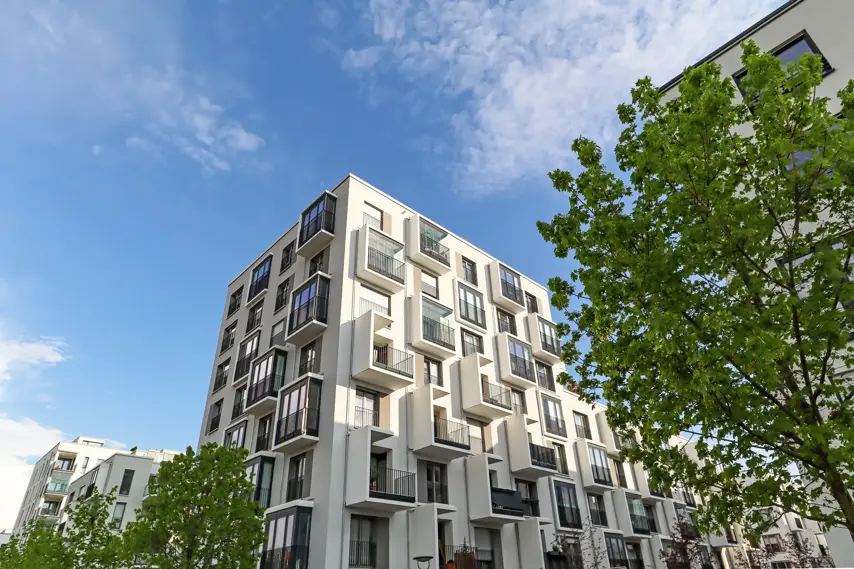 Cityscape of a residential area with modern apartment buildings, new green urban landscape in the city