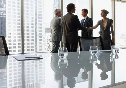 Business meeting handshake